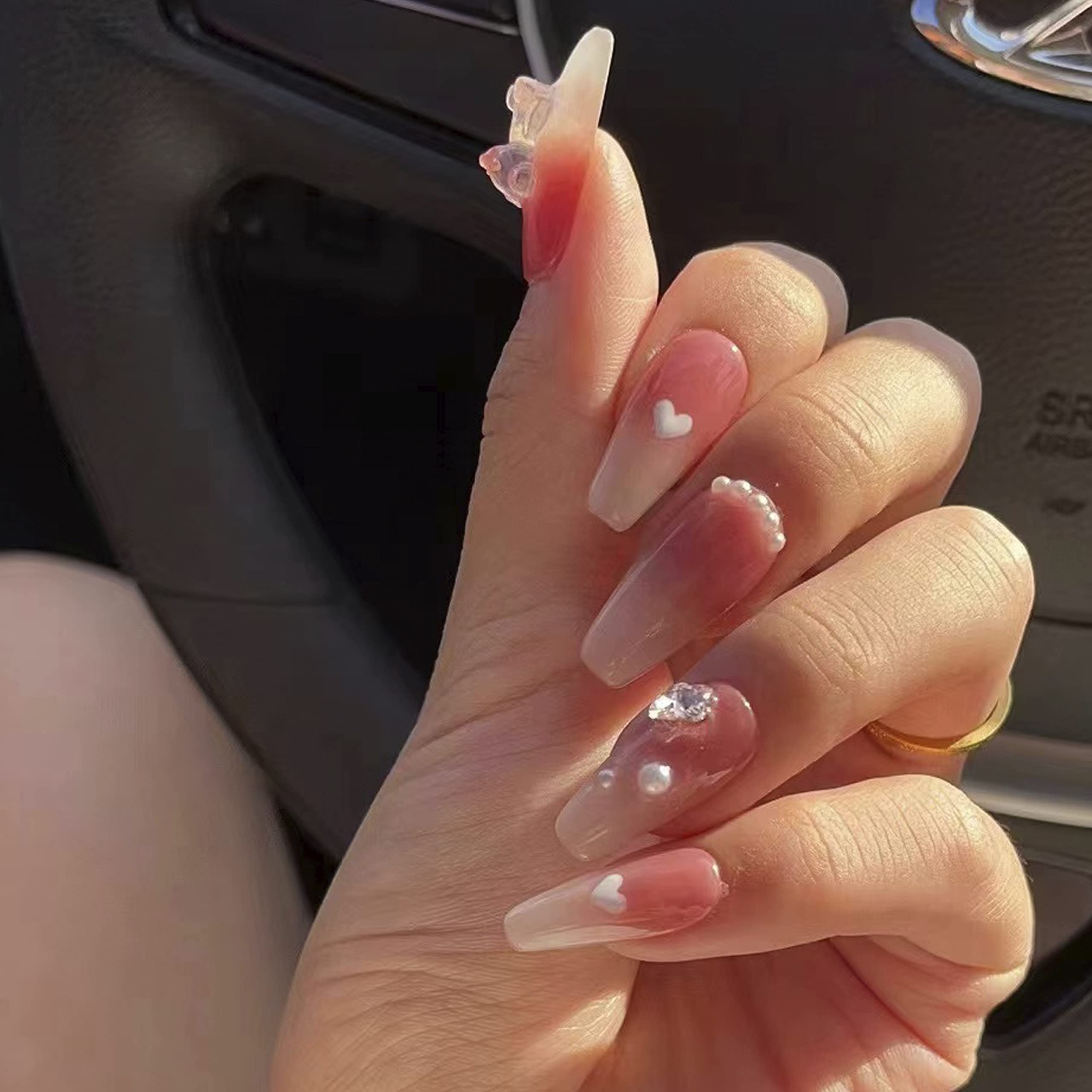Light Rain small-size nails with a unique hand-painted design for a chic look.