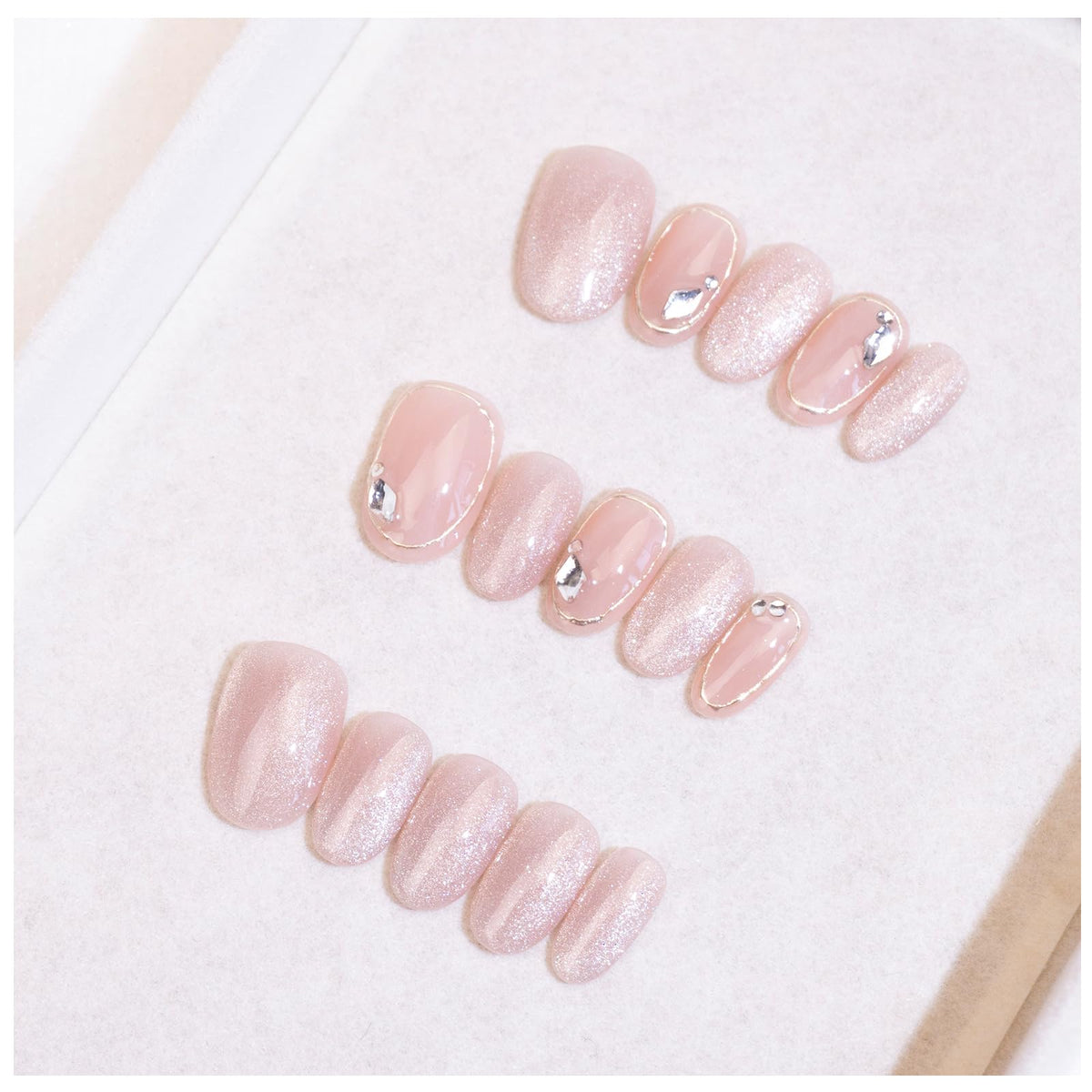 Light Rain small-size press-on nails with hand-painted design for at-home luxury manicure