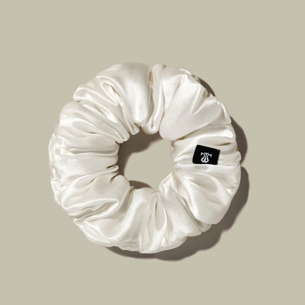 LilySilk silk hair scrunchie with silk-shine finish reduces snagging and frizz.