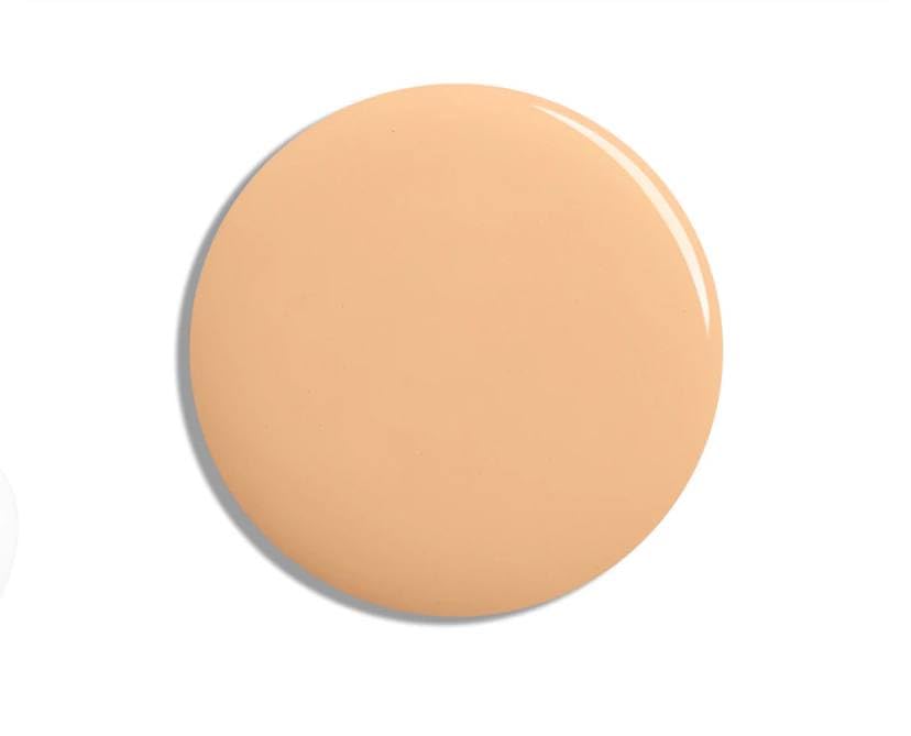 Lisa Eldridge seamless skin tint in application action for a seamless finish.