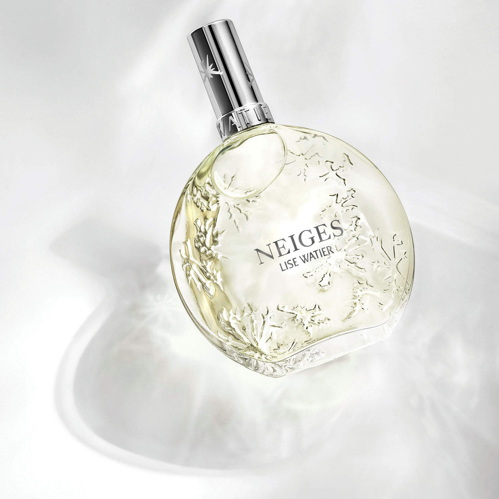 Lise Watier Neiges bottle cap close-up highlights premium packaging