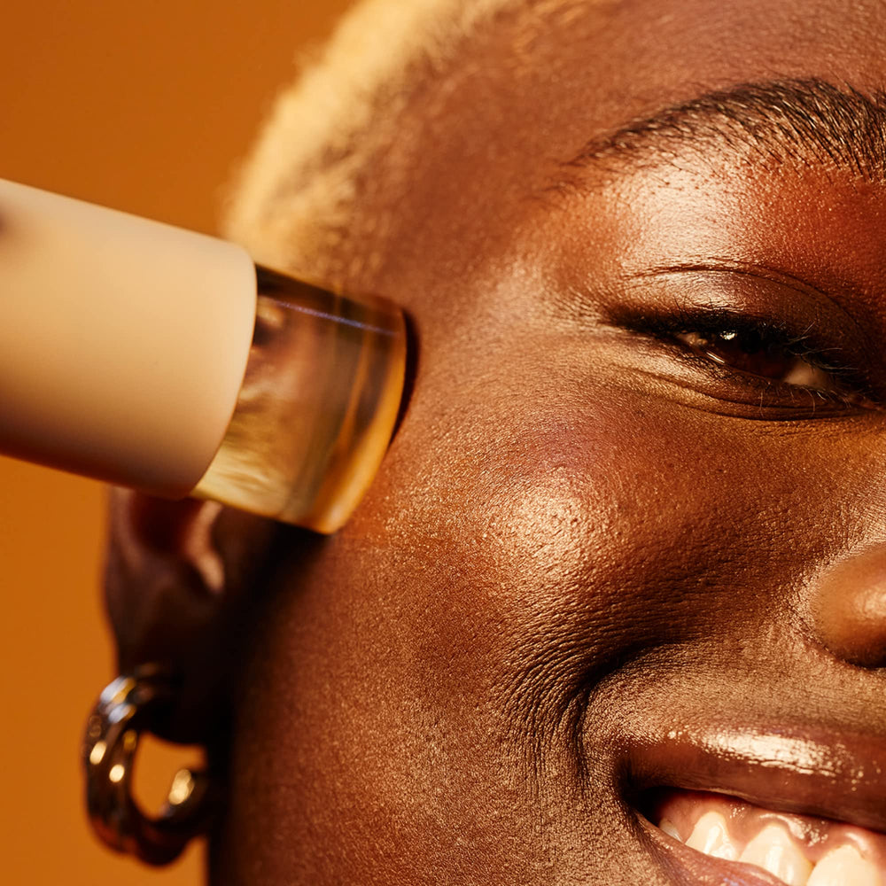 Compact 0.77oz Hueguard sunscreen for travel and touch-ups.