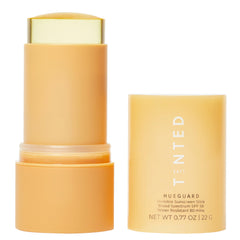 Live Tinted Hueguard stick applied smoothly for invisible sun protection.