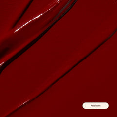 Live Tinted Huelip Lip Crème brick red swatch showing rich color payoff.