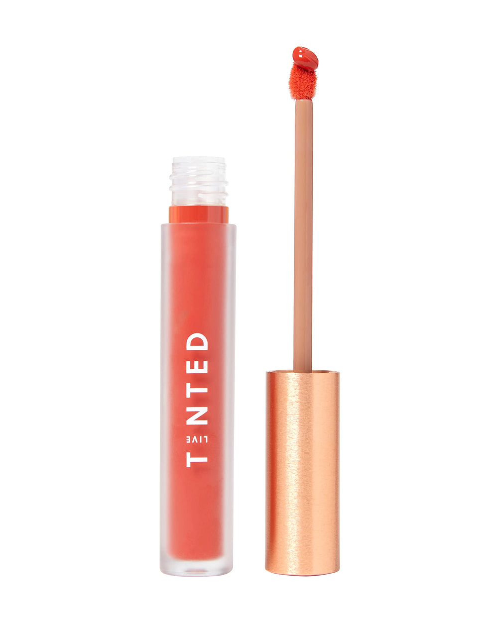 Live Tinted Huelip packaging shows sleek orangey red lip creme.