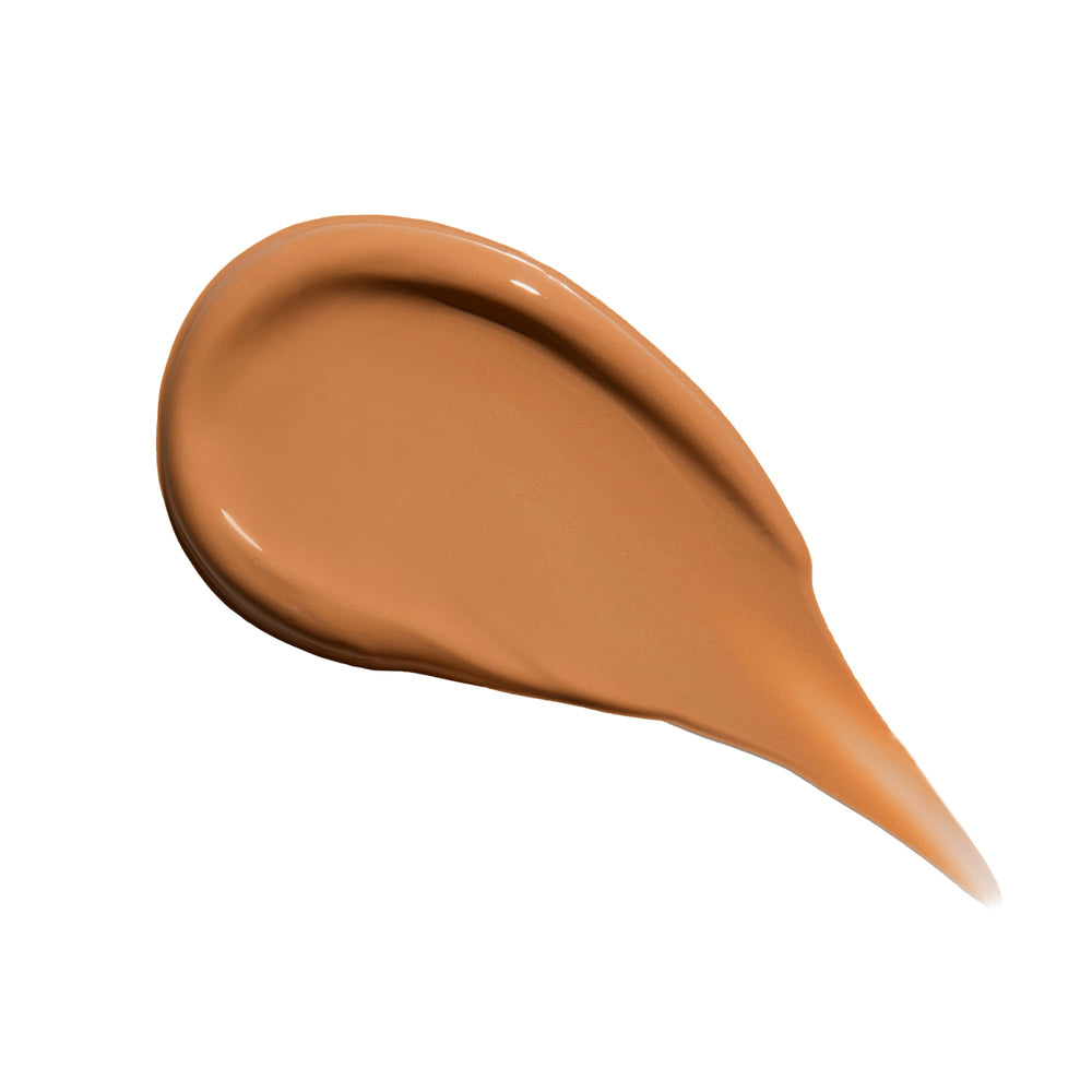 Live Tinted Hueskin Serum Concealer creamy texture blends smoothly for natural finish.