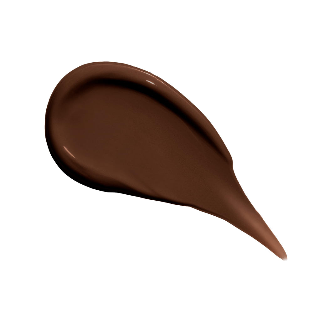 Live Tinted Hueskin Serum Concealer under-eye area demonstrating brightening coverage.