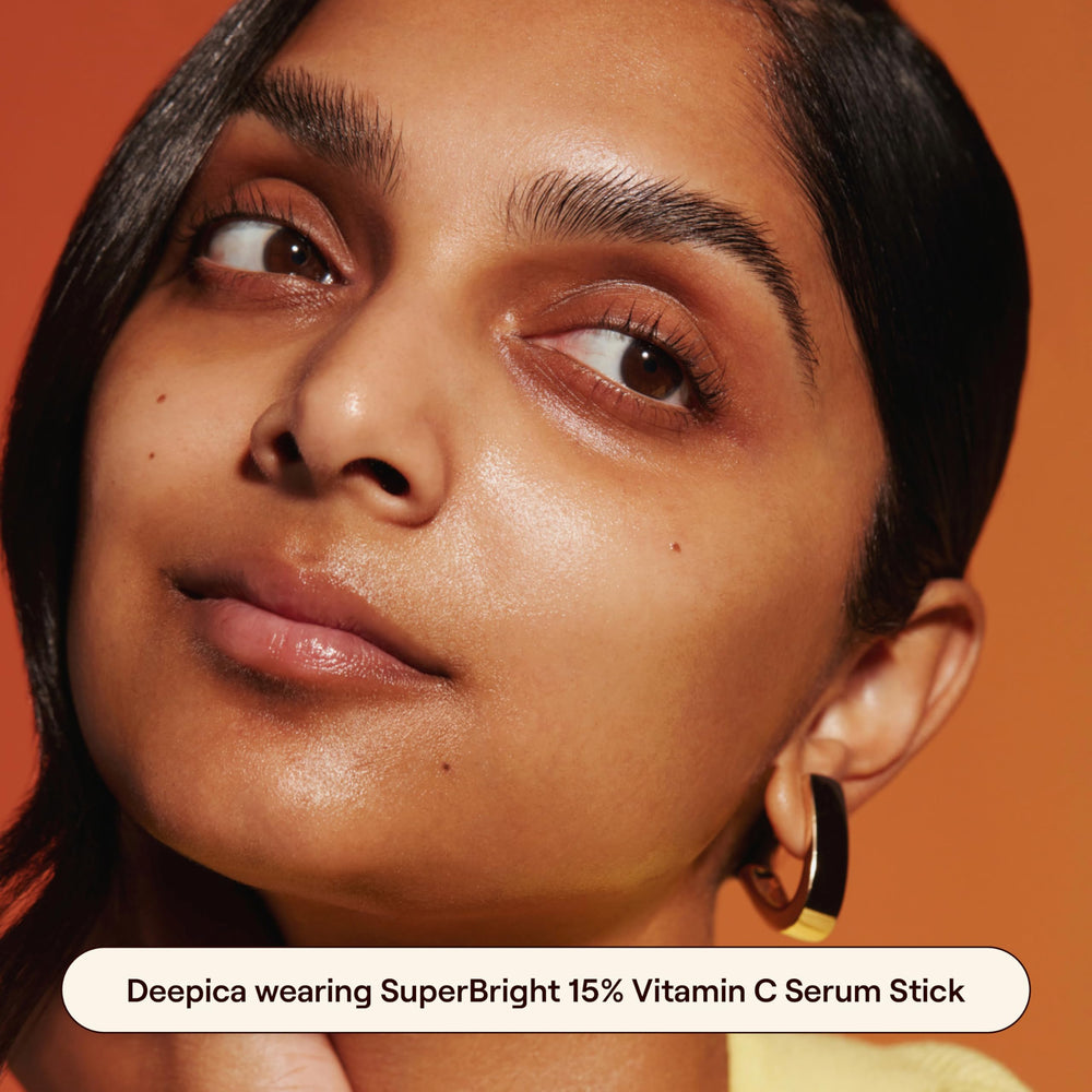 Live Tinted serum-stick dispense tip gliding onto clean skin