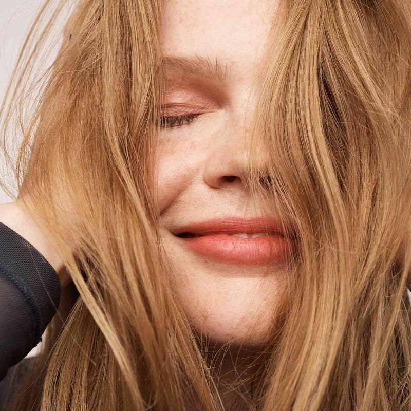 Living Proof Dry Shampoo with time-release scent delivering a fresh aroma throughout the day.