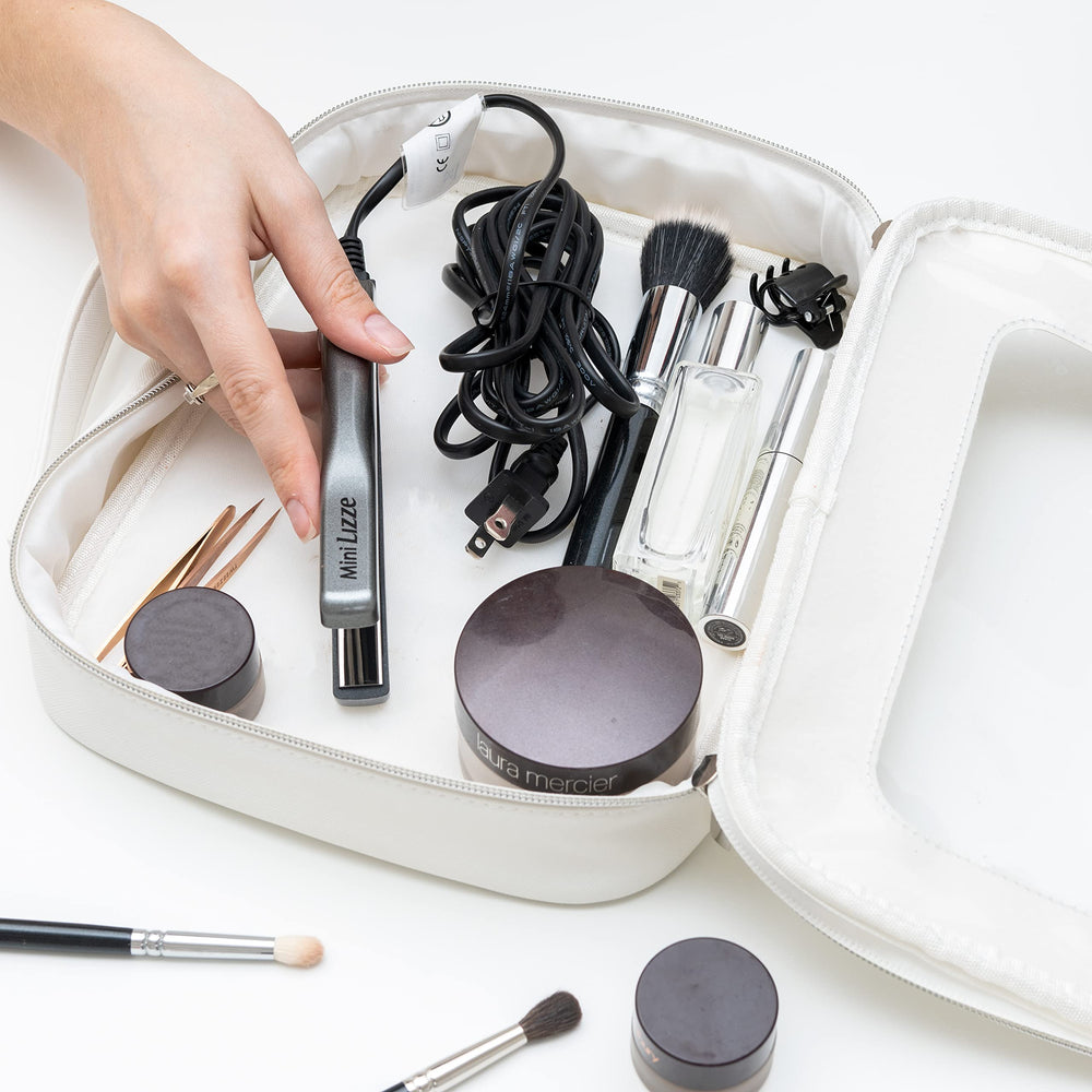 Lizze Mini pocket-size iron ready to slip into bags for quick fixes.