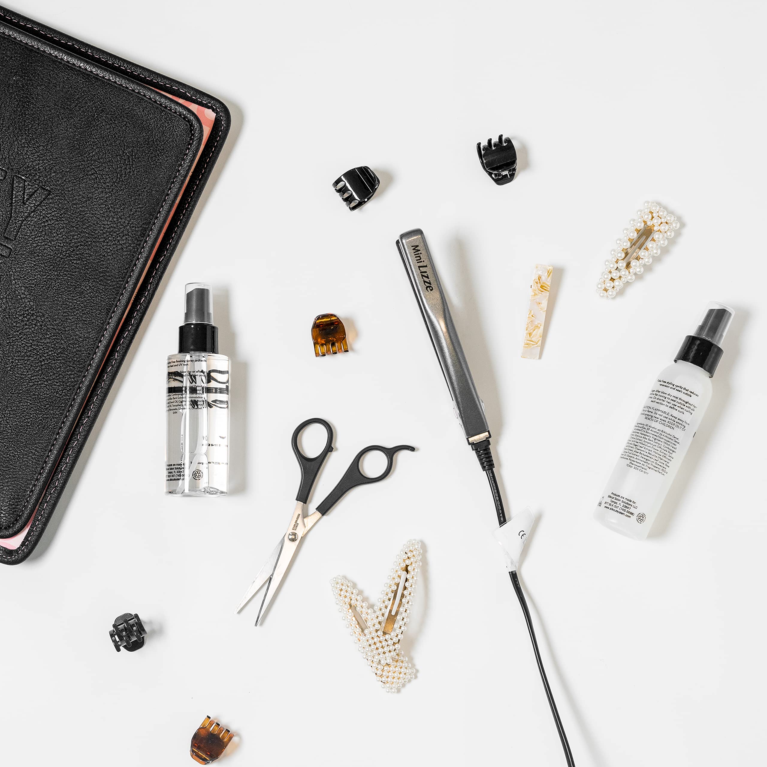 Lizze Mini portable iron on the go enables quick outfit refreshes.