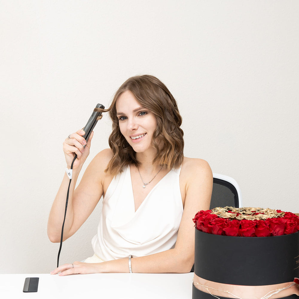 Lizze Mini sleek-surface design highlights a modern, portable styling tool.