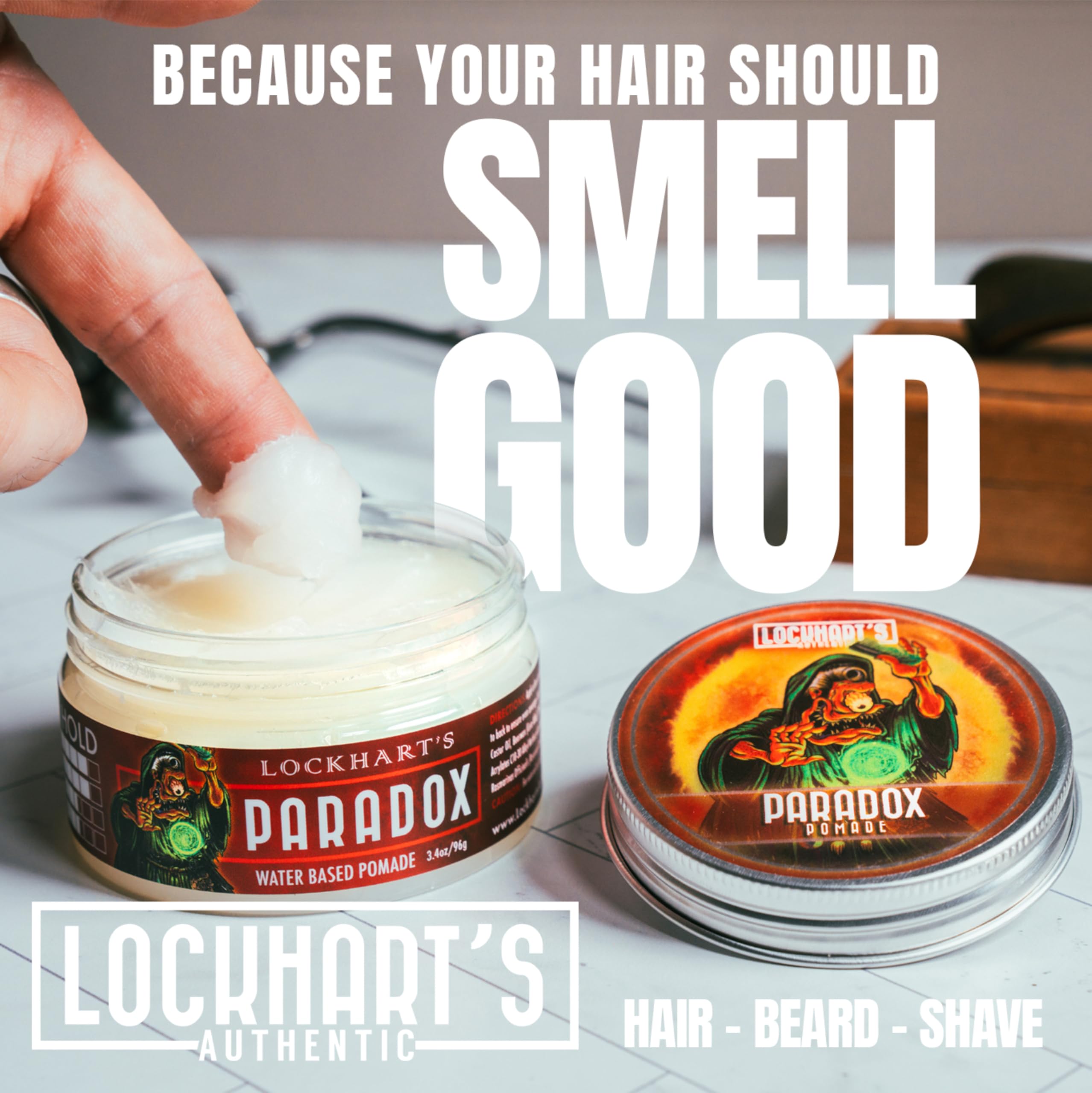 Lockhart's Paradox hands applying pomade for flexible, all-day hold