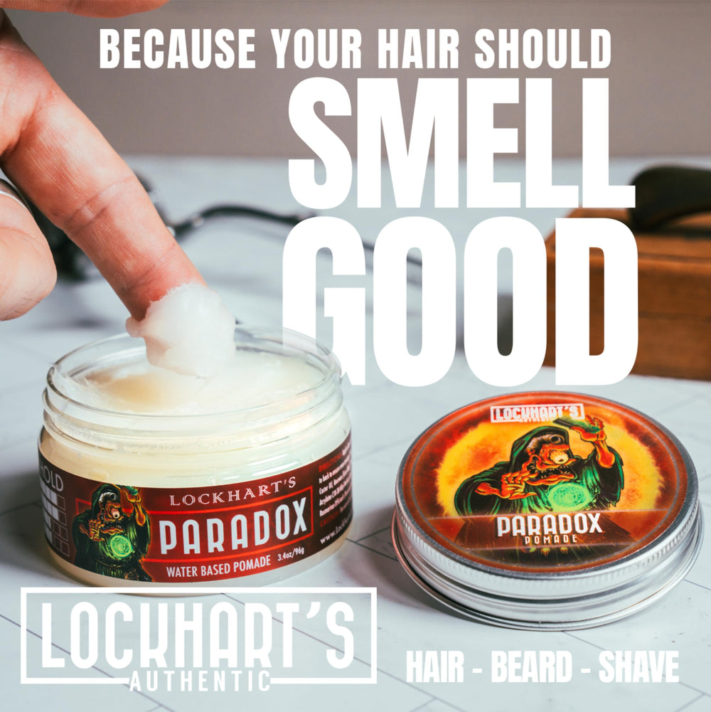 Lockhart's Paradox hands applying pomade for flexible, all-day hold