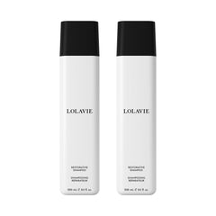 Lolavie Restorative Shampoo bottle on bathroom shelf suggesting healthier-looking hair.