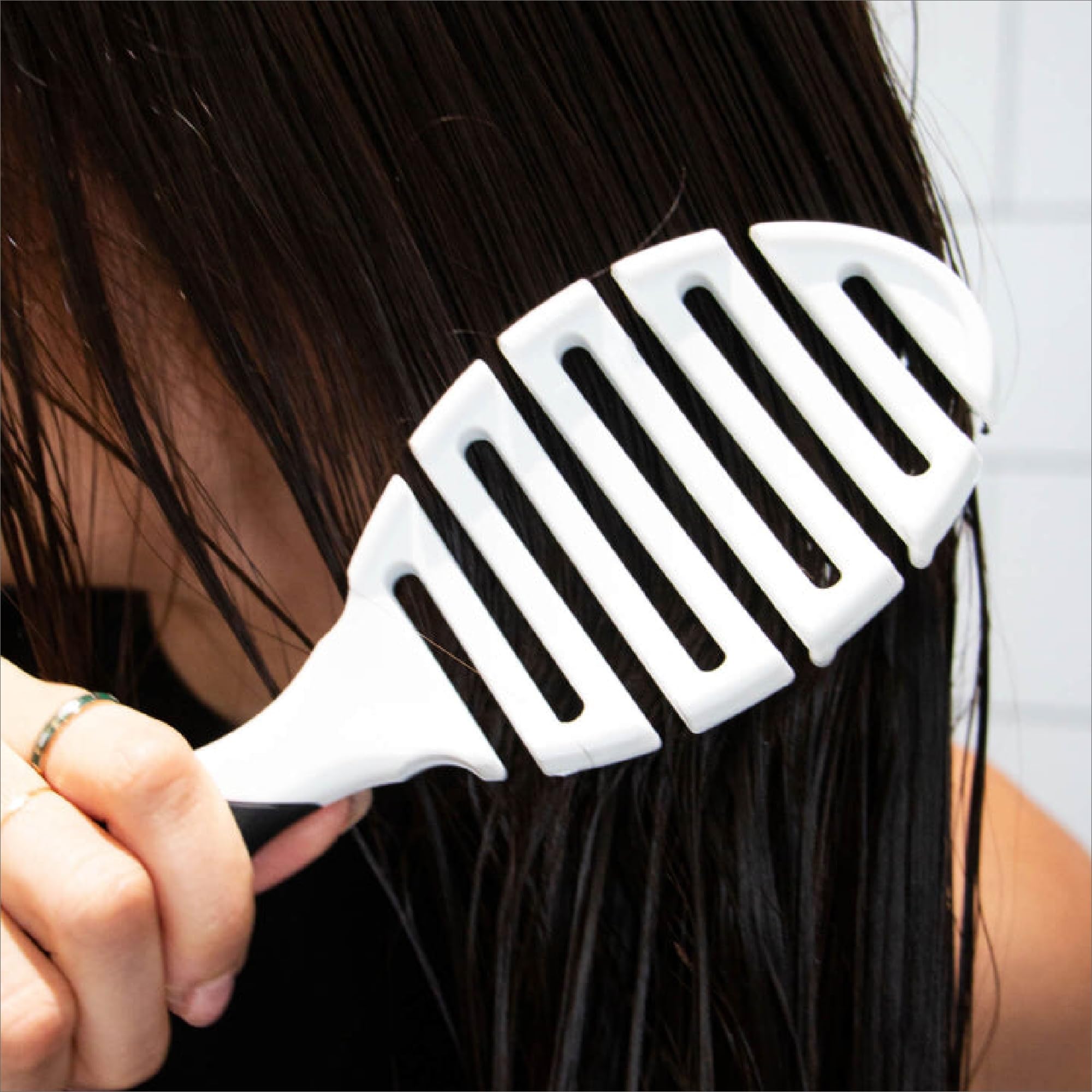 LolaVie detangles dry hair smoothly with Pro Flex Dry for even results