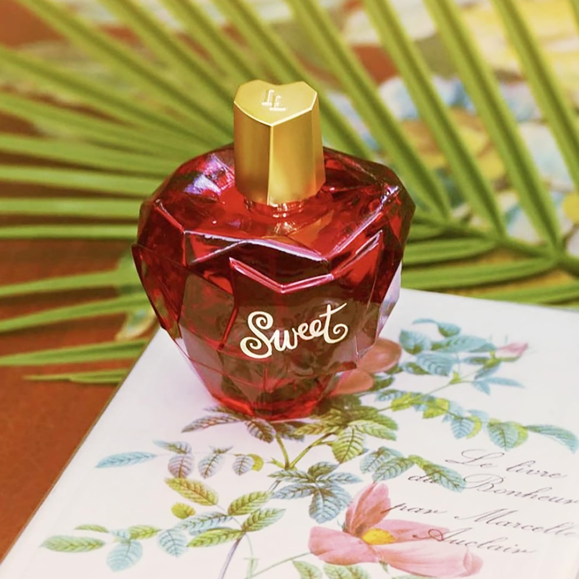 Lolita Lempicka Sweet Duo bottle side shows iconic feminine silhouette