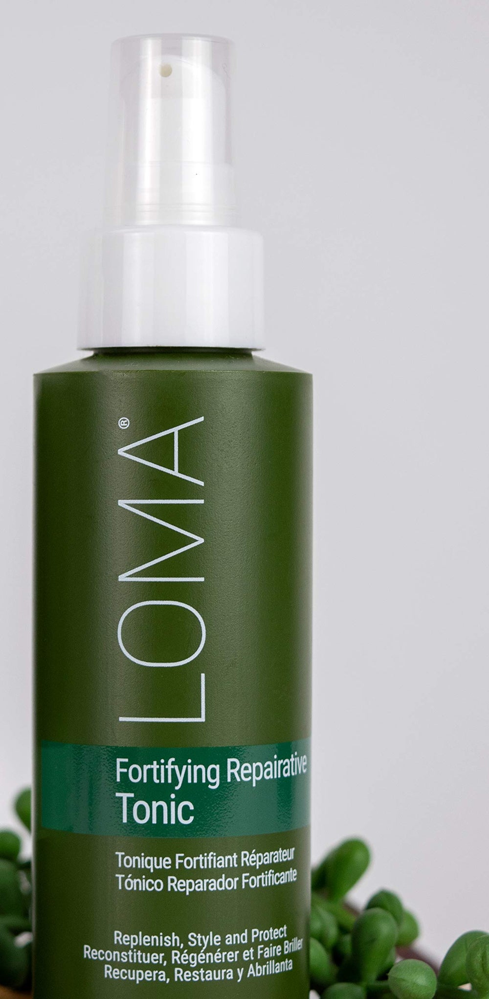 Loma Fortifying Reparative Tonic shows a silky shine and smooth texture.