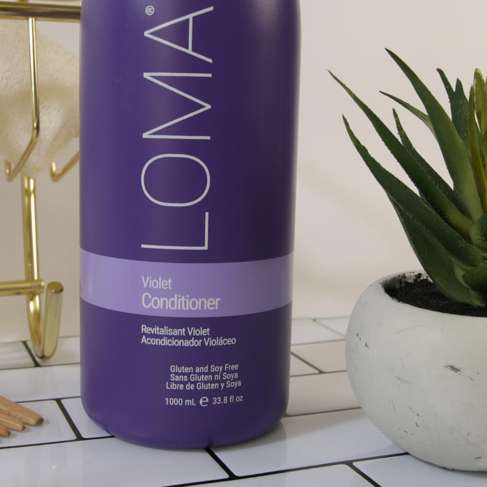 Loma Violet Conditioner on bathroom shelf ready for daily use.