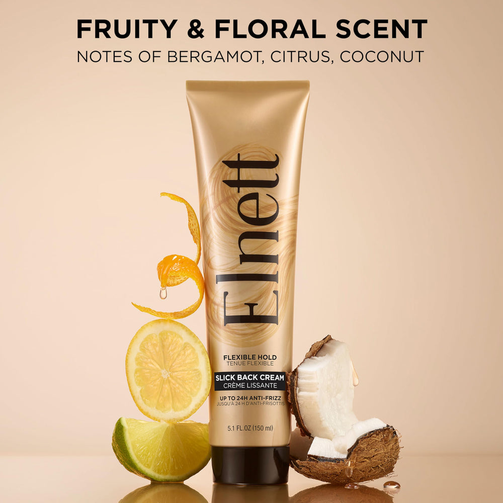 Brushed-through hair with Elnett Slick Back for a sleek, defined style.