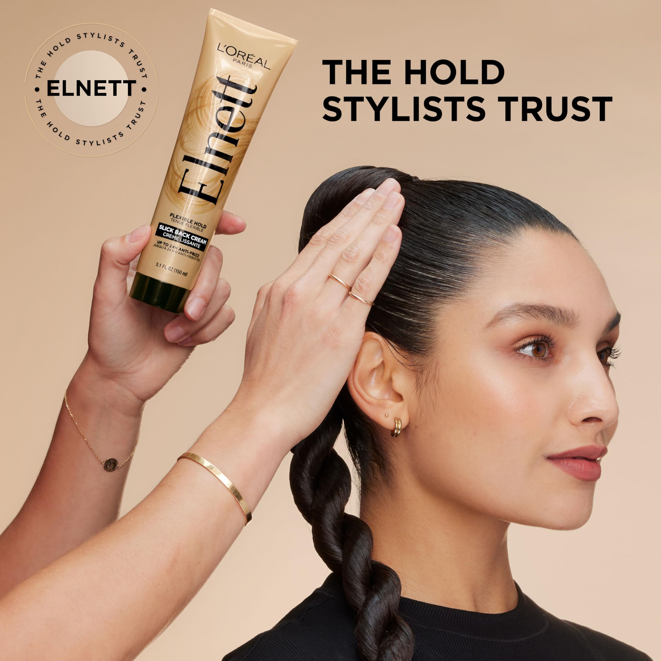 Hands applying Elnett Slick Back cream for a smooth slick-back look.