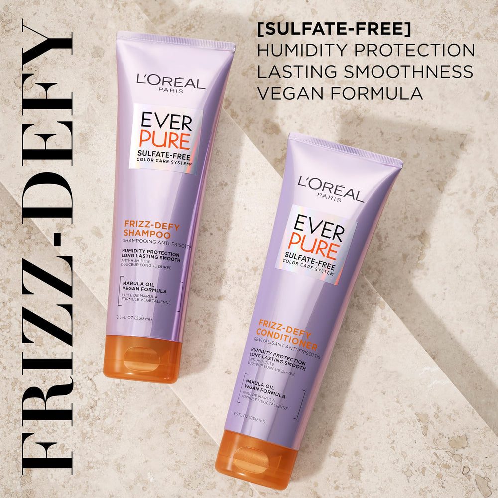 L'Oreal Paris Frizz Defy Conditioner tube shows humidity resistance.