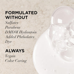 Frizz Defy set on bathroom shelf promotes frizz control and color care.