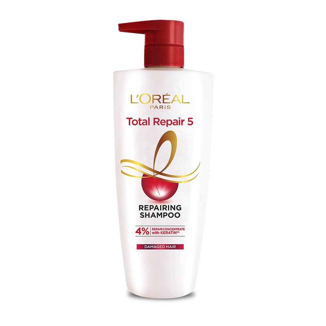 L'Oreal Paris Total Repair 5 shampoo bottle on shelf for daily cleansing and refreshed hair.