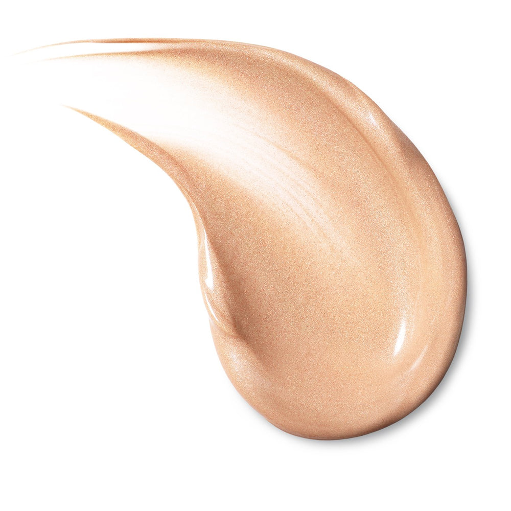 Gold packaging of L'Oreal Paris Visible Lift Luminous Serum Tint indicating radiant color and skincare basics.