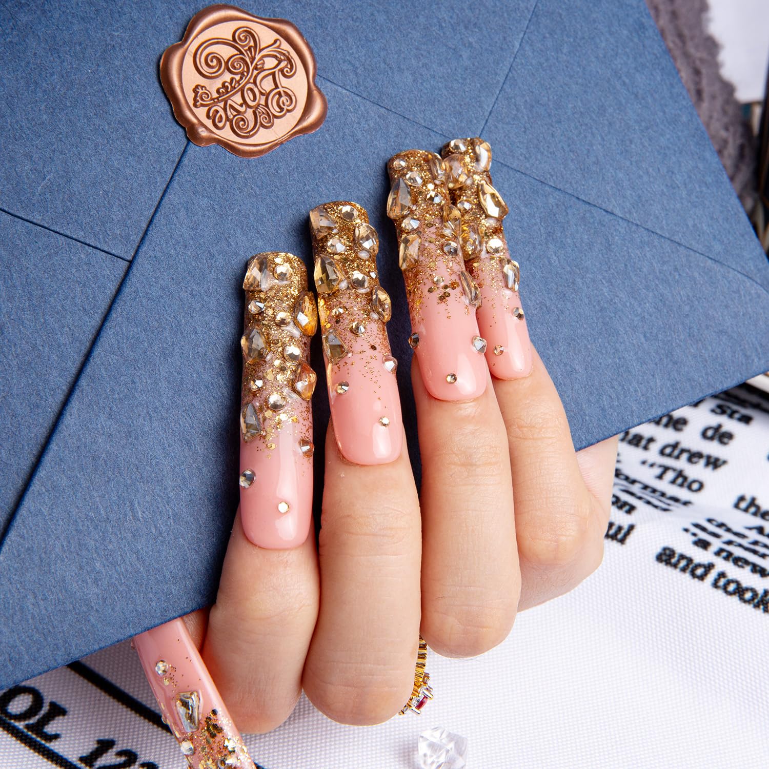 LOVFUL Luxury fake nails captured for glam night-out vibes.