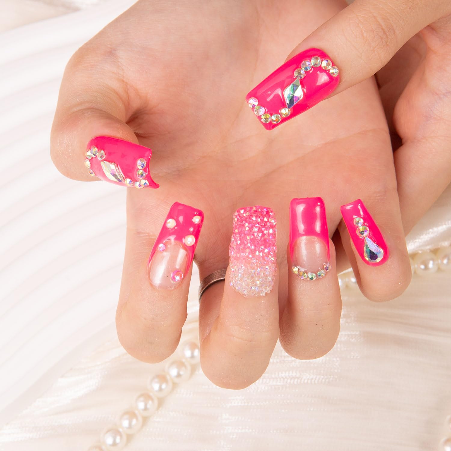 LOVFUL Pink Typhoon square 1in nails on hand demonstrate fast, thoughtful application.