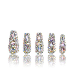 LOVFUL press-on nails with rhinestones on a hand, offering an elegant, quick at-home manicure.