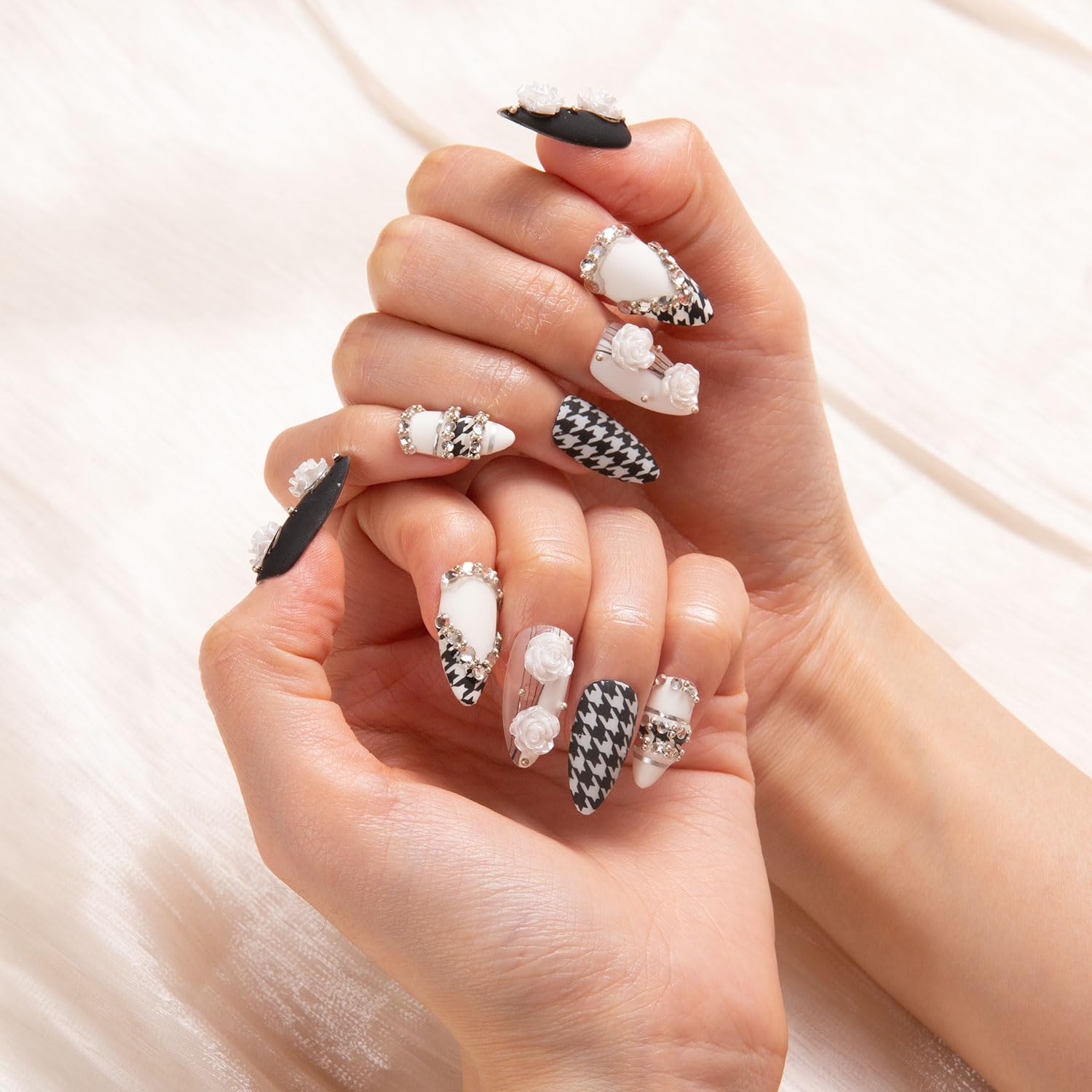 LOVFUL houndstooth nails on hand demonstrate full coverage and salon finish.