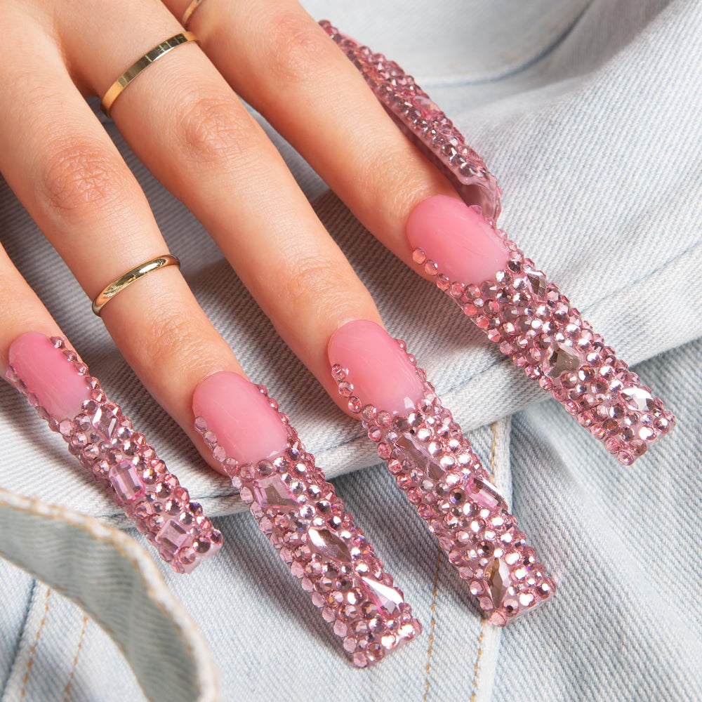 LOVFUL reusable nails featuring pink French tip and crystals for versatile reuse.