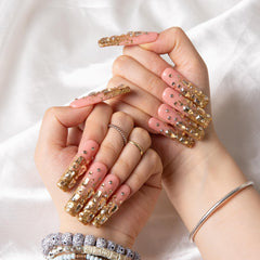 Lovful Stardust Nails square mid-length nails in gold rhinestones