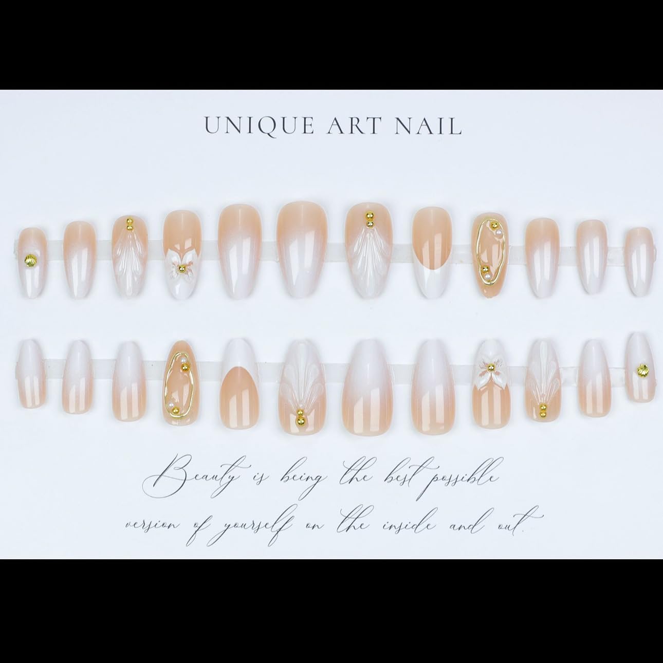 LPOODDNU almond press-on nails with white tips and gilded details.