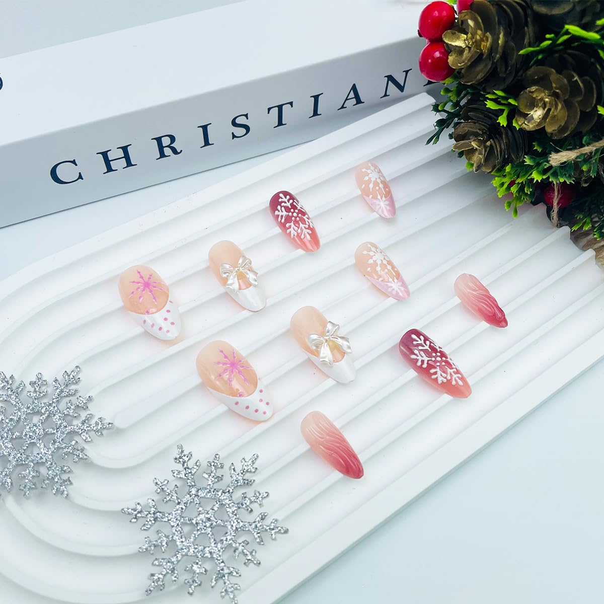 LRKNNO snowflake design nails for shimmering seasonal flair.