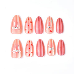 Lukmexor short almond nails with glossy pink glitter finish for daily wear.