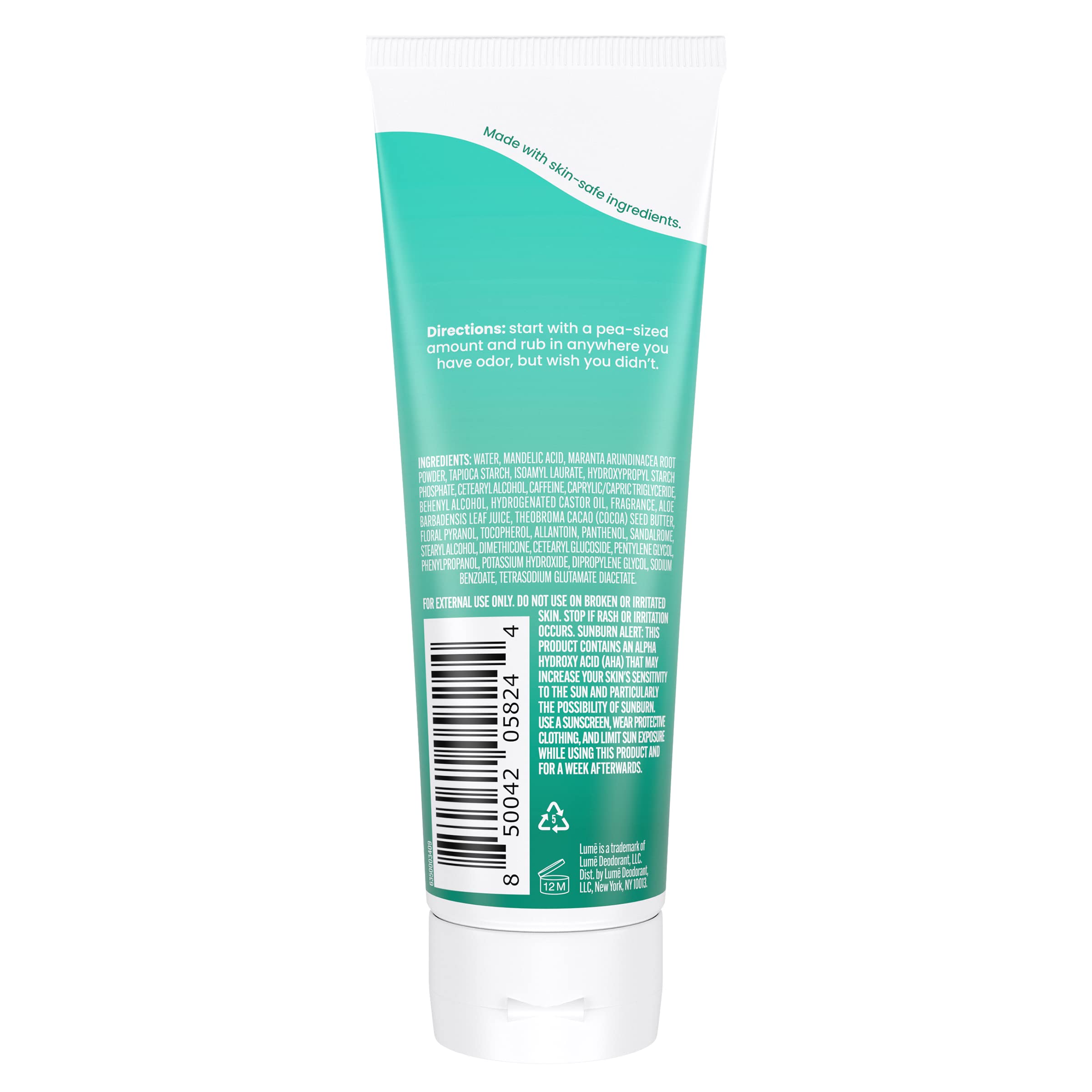Applying Lume Minted Cucumber invisible cream for all‑day freshness.