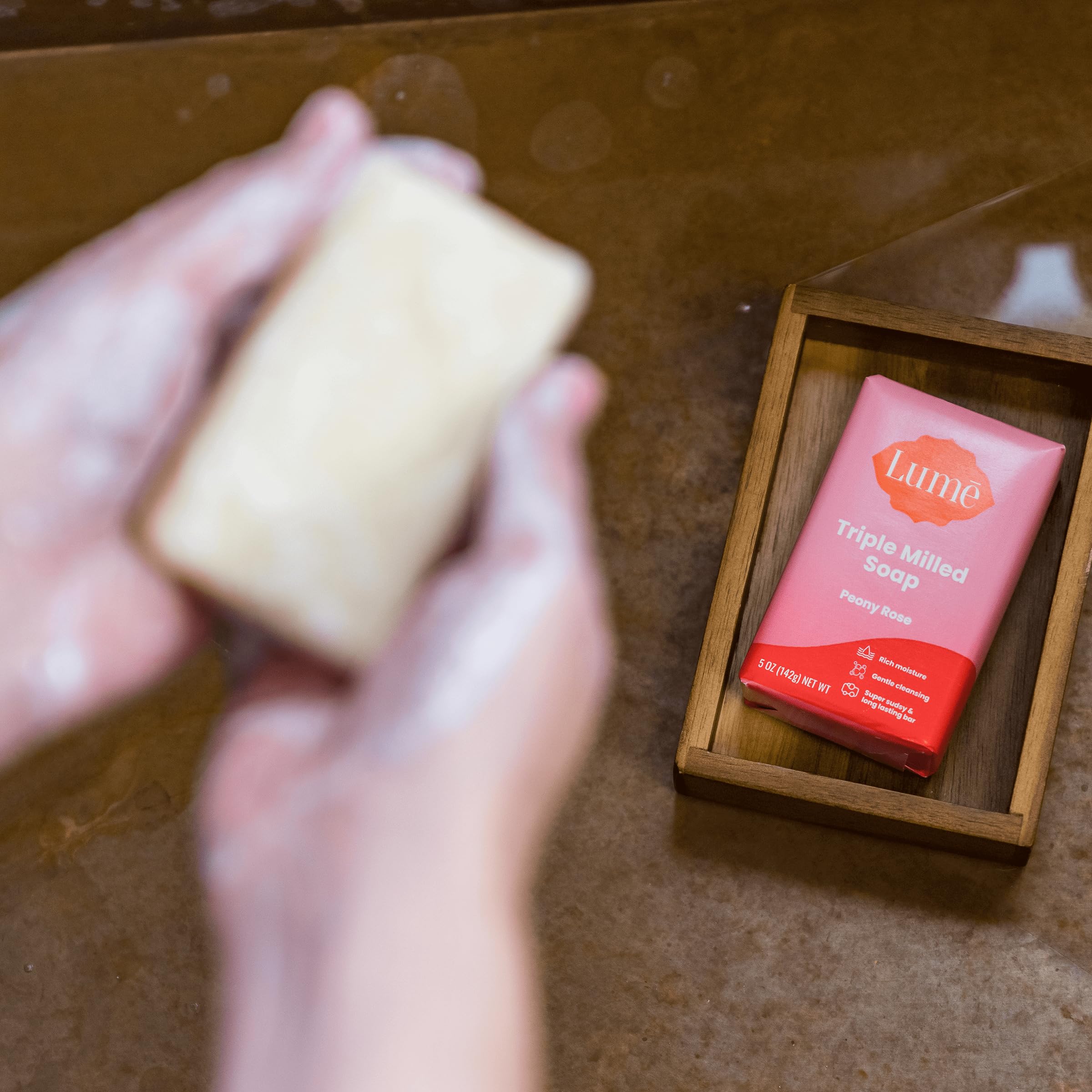 Lume Peony Rose Wipes packaging highlighting travel-friendly design.