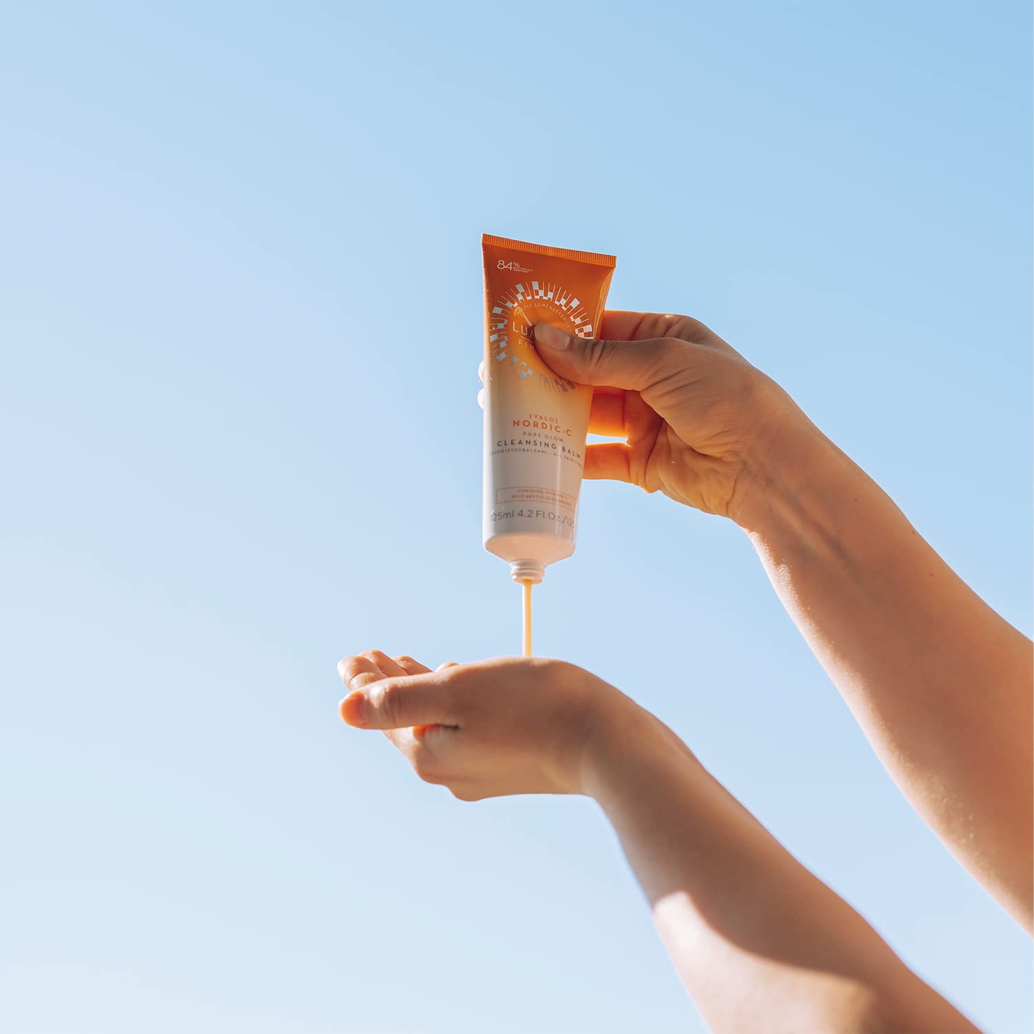 Lumene Nordic C Pure Glow cleansing balm packaging display highlighting vegan formula.