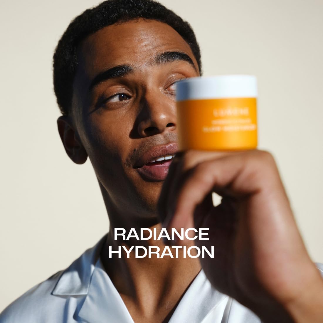 Lumene Nordic-C Valo Glow Moisturizer in a bright bathroom setting for daily glow.