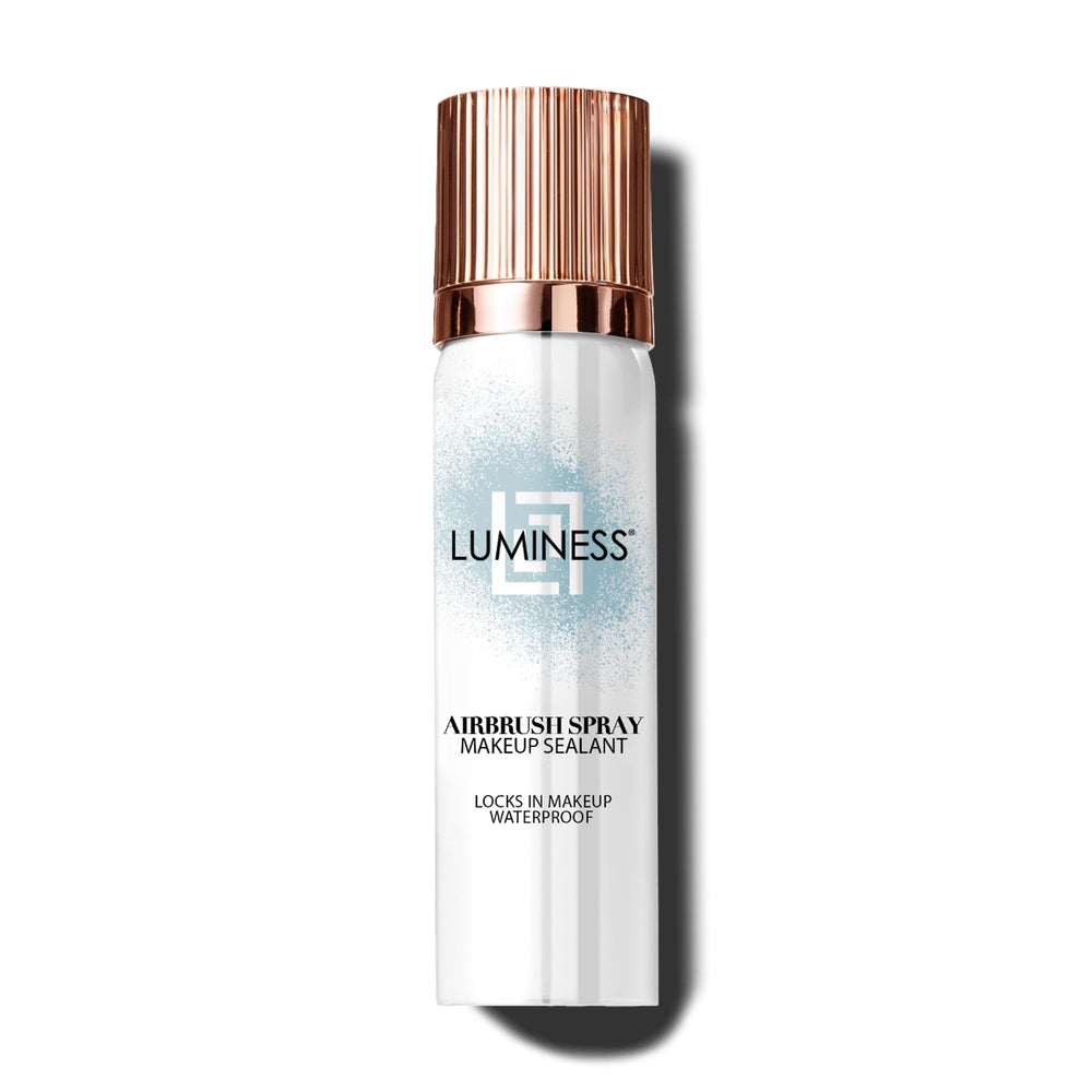 LUMINESS Waterproof Setting Spray bottle close-up for long-lasting makeup.
