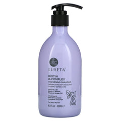 L Luseta Biotin B-Complex Thickening Shampoo bottle promotes voluminous, nourished hair