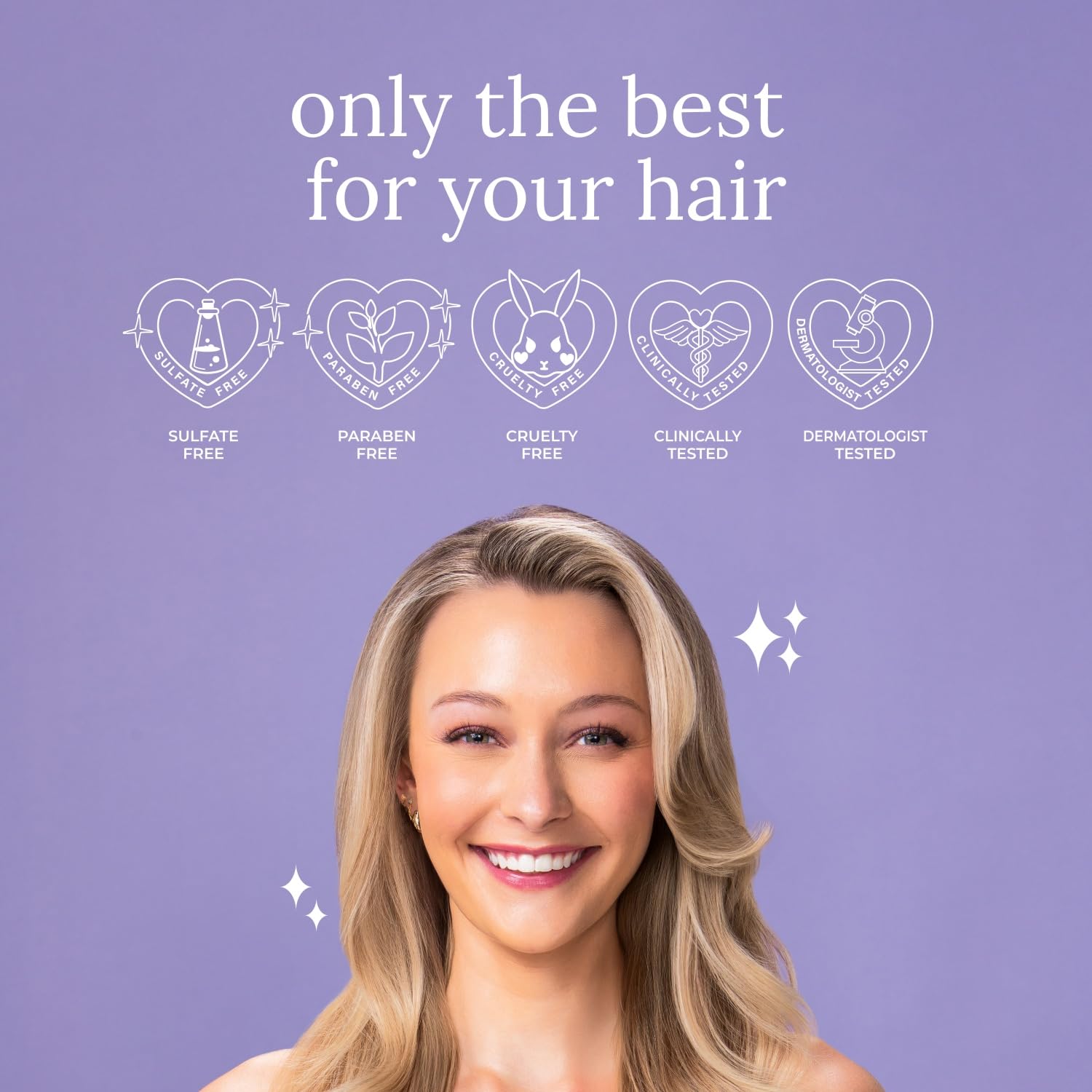 L Luseta Biotin Trio serum dropper applying to mid-lengths and ends