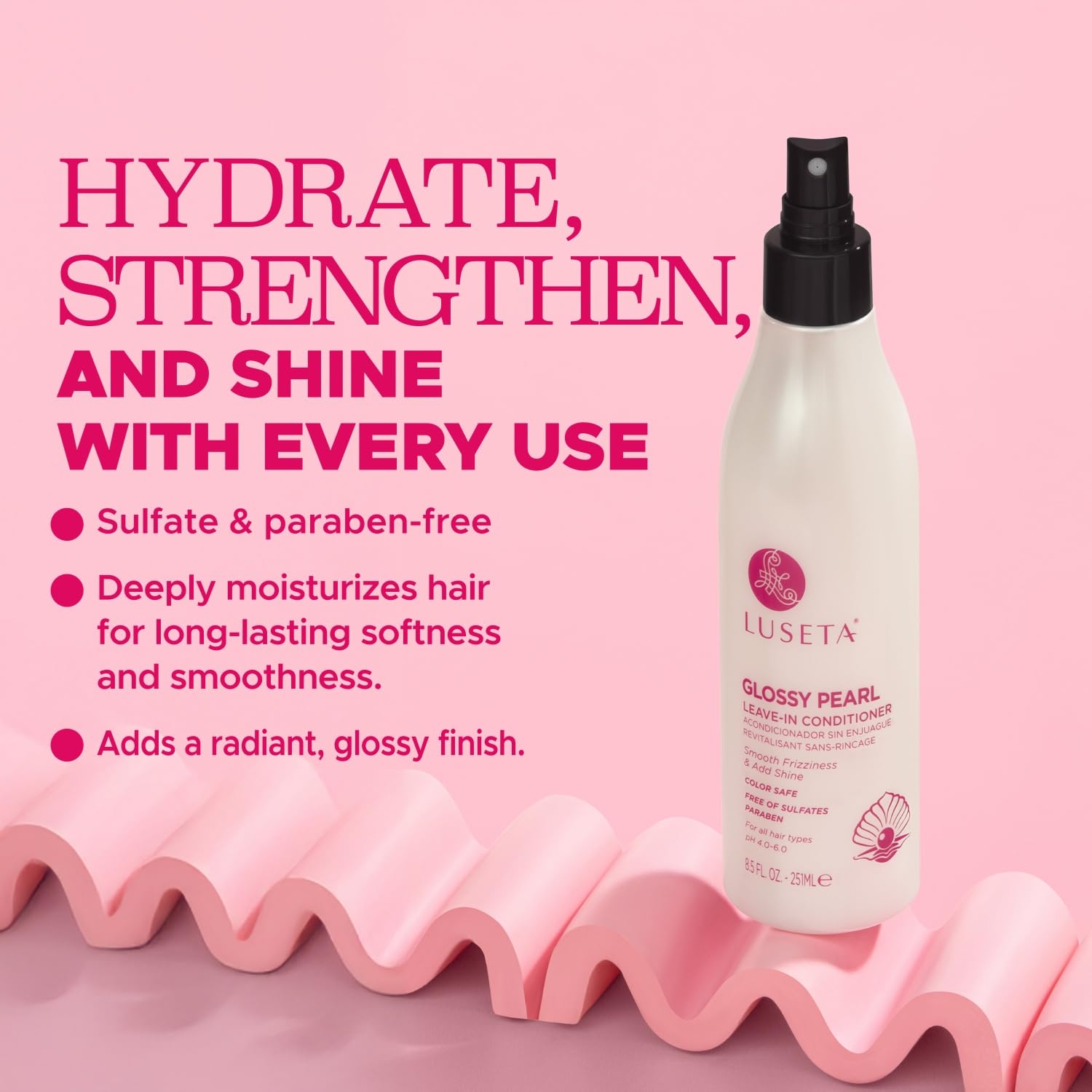 Luseta Glossy Pearl Leave-In Conditioner bottle closeup shows pearl-infused nourishment.