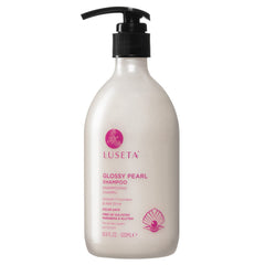 Luseta glossy pearl shampoo bottle front showing smooth, frizz-controlled shine.