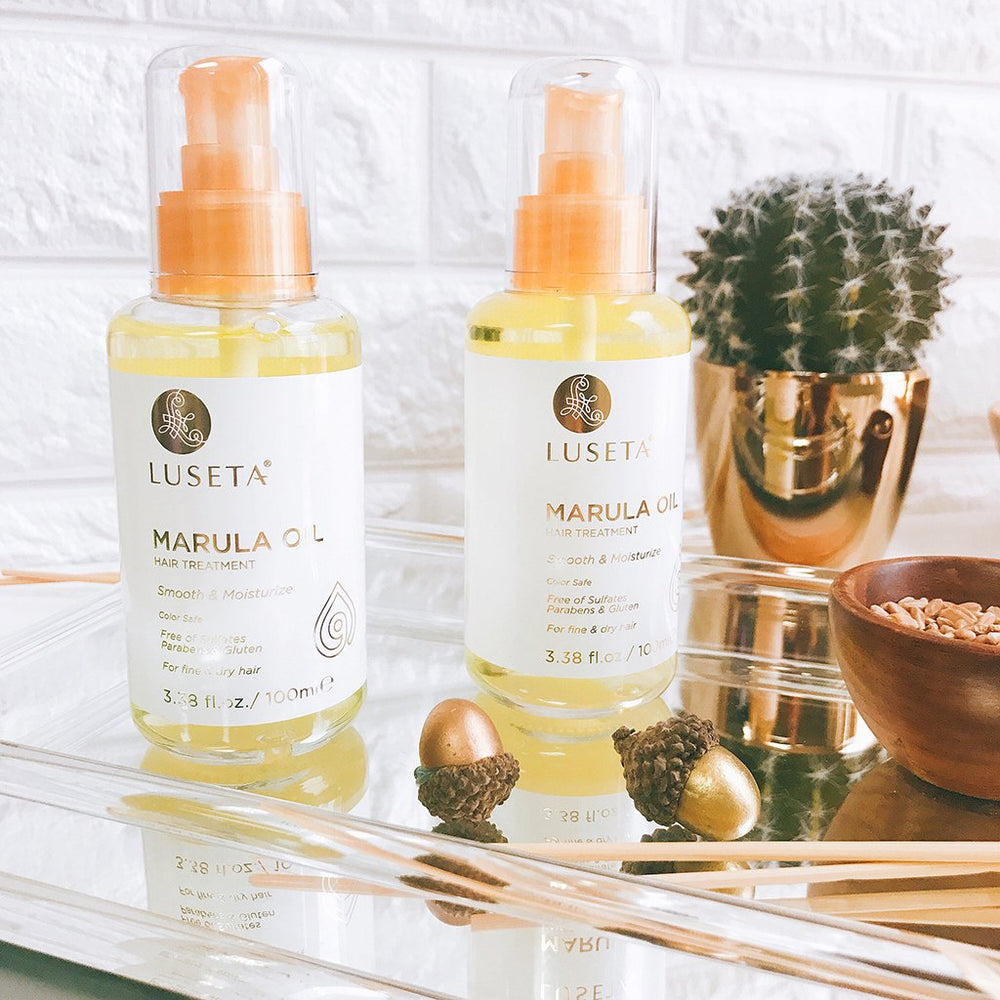 Luseta Marula Oil Hair Treatment being dispensed highlights easy application and quick styling.