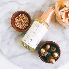 Luseta Marula Oil Hair Treatment packaging label illustrating smoothing and shine for hair.