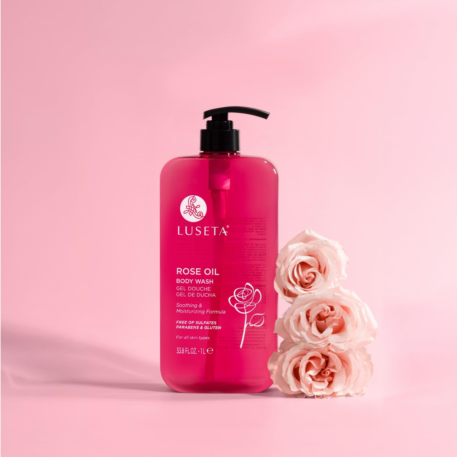 Luseta Rose Oil Body Wash pump-dispense bottle delivering rich lather for cleansing.
